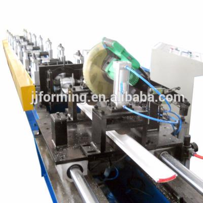 China Hotels Used Metal Roof Panel Roll Forming Machine Good Appearance Steel Profile Roller Shutter Door Frame Door Frame Machine for sale