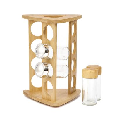 China Wholesale Viable Kitchen Triangle Spice Rotating Rotating Bamboo Jar Rack Set Organizer with 12 Glass Jar for sale