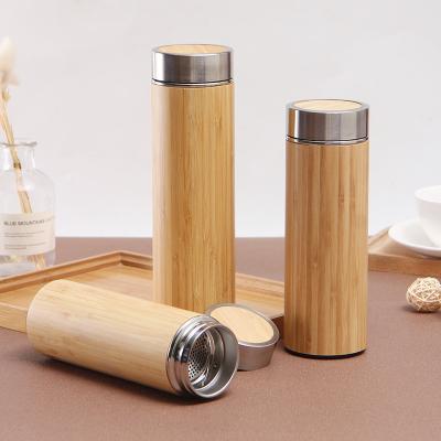 China Sustainable Custom Wooden Bamboo Water Bottle Thermos Bottle 500ml Travel Mug Tea Gifts Stainless Steel Stainless Steel Water Bottle Mug for sale