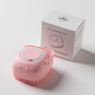 China Silicone Stocked Yellow Pink Multifunctional Brush With Dispensers Baby Dog Cat Pet Grooming Slicker Cleaning Brush With Box for sale