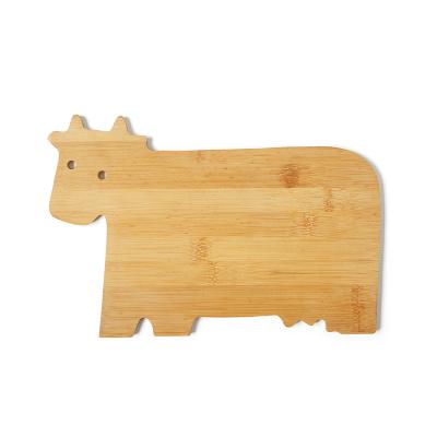 China Custom Viable Cow Bamboo Animal Tree Chopping Plates Cutting Plates Natural Fruit Vegetable Meat Cutting Board for sale