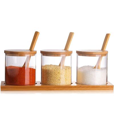 China Viable Wholesale Glass Bamboo Lid Spoon Seasoning Jar With Tray Seasoning Box Set for sale