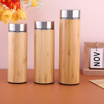 China Thermos 2022 Sports Sustainable Fitness Stainless Steel Smart Bamboo Insulated Bamboo Water Bottle With Filter Cup for sale