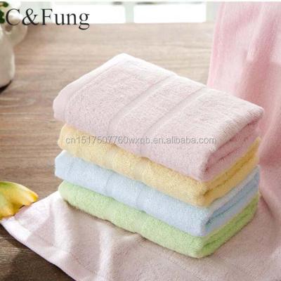 China Compressed Luxurious Silky Soft Organic Bamboo Fiber Clean Towel for sale