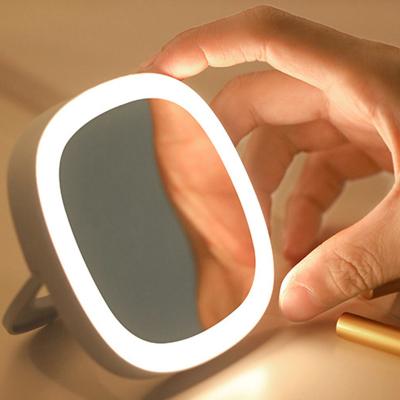 China New Lighted Vanity Makeup Mirror With Travel Mini Pocket Portable Hand LED Light Mirror Light For Makeup for sale