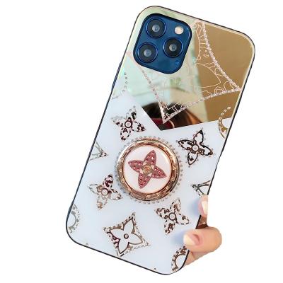 China Luxury Shockproof Two Color Electroplate Shockproof Wholesale IMD Mirror Diamond Phone Case Camera Protective Cover Ring Buckle For iPhone for sale