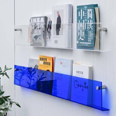 China Viable Creative Acrylic Wall Magazine Rack Picture Book Holder Kindergarten Wall Store Shelf Decoration for sale