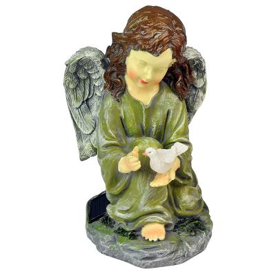 China Solar Handwork LED Garden Decor Angel With Glowing Dove Garden Statue Resin Fairy Crafts for sale