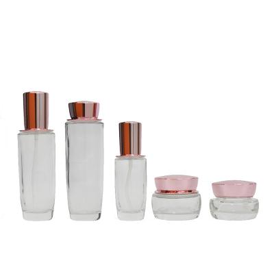 China Cosmetic lotion bottle 100ml 120ml 40ml 30g 50g frosted lotion glass bottle and cosmetic glass jar for cosmetic set packaging for sale