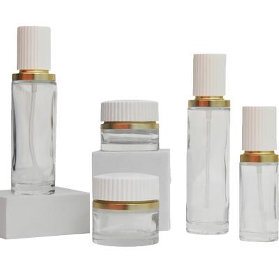 China 30g 50g 40ml 100ml 120ml Lotion Pump Bottle Cosmetics Packaging Containers Set Glass Refillable Cosmetic Jar for sale