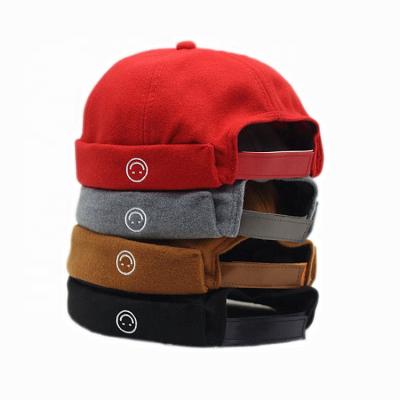 China Newest Fashion COMMON Folding Logo Brimless Skullcap Baseball Hat Woolen Smile for sale