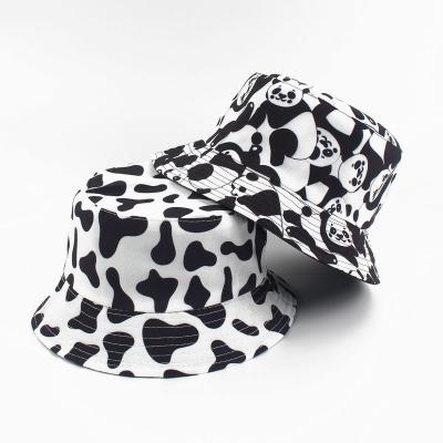 China Factory Sale Cow Pattern Printing Fisherman Hat Woman New Double Face Bucket Hat Man Summer Sun Outdoor Checked Hat for sale