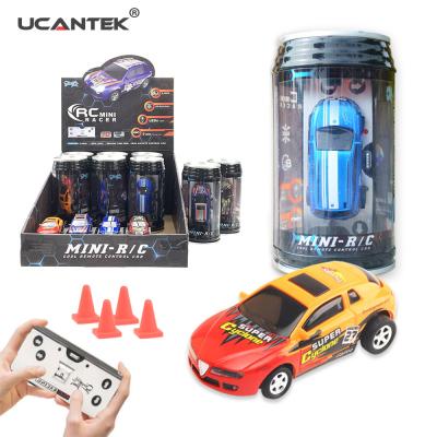 China RC Hobby Display Box 2.4G 1/64 4CH Mini Coke Can RC Car Truck Toys Mini RC Car with LED Headlights and Roadblocks for sale