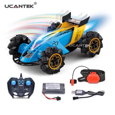 China RC Hobby Top Selling Rechargeable RC Car Toys 2.4GHz Remote Hand Gesture Feeling RC Racing Stunt Car for sale