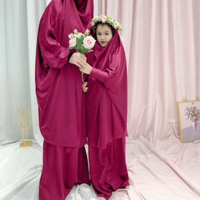 China Sardines Turkey&Dubai Solid Color Encrypted Muslim Casual Satin Two Pieces Abaya Ramadan Sets Big Swing Solid Color Kaftan Parent-Child Long Dress for sale