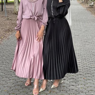 China Elegant Casual Elastic Waist Mid Length Line A Polyester Spring Fashion Women Solid Midi Muslim Pleated Skirt Long Maxi Skirt for sale