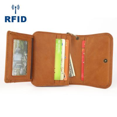 China Luxury Genuine Leather RFID Coin Purse Coin Holder Pocket Card Holder Money Bag Key Chain Girls Small Purse Mini Wallet for sale