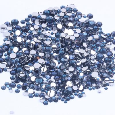 China Flatback Wholesale 2-6mm Faux Stone Back Montana Non Hotfix Resin Round Flat Bulk for sale