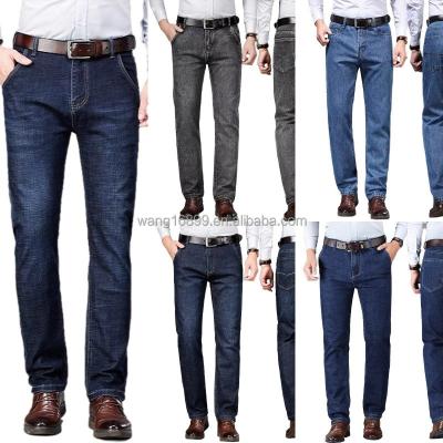 China QUICK DRY Wholesale large size slim straight trousers casual men jeans trousers work for sale