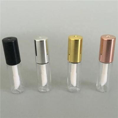 China Cosmetics factory price 1.2ml empty plastic clear lip gloss tubes mini with gold cap sample lip gloss container with black cap for sale