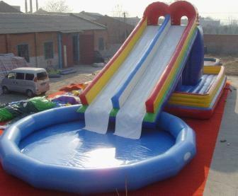 China OEM Commercial Inflatable Slides Giant Water Slides With Swimming Pool for sale