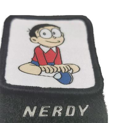 中国 PVC Rubber Garment Labels Sustainable Polyester Velcro Embossed Cartoon 販売のため