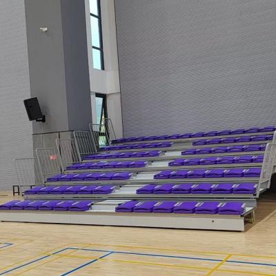 China Steel Frame Retractable Bleacher Seating with Floor Mounted Seat for sale