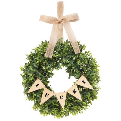 China New Trendy Dola Design 16 Inch Green Lucky Wreath Leaves for Front Door Welcome Wall Decor for sale