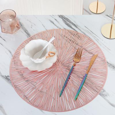 China Sustainable Nordic Tanning Plastic Eco-friendly Table Mats Placemat Restaurant PVC Hollow Solid Color Firework Place Mat for sale