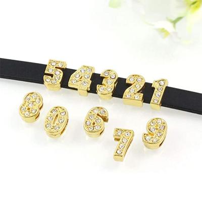 China DIY Gold Charms For Jewelry Making Numbers Letter Accessories Bling Diamonds DIY Bracelet Charms Black Hand Strap for sale