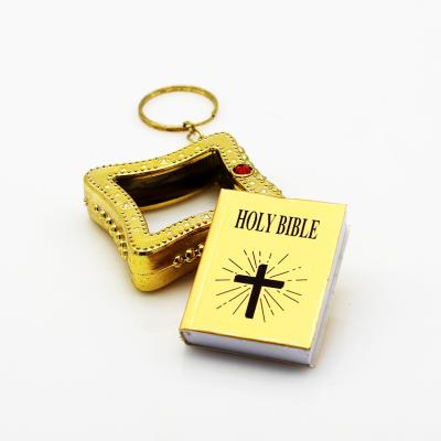 China Metal Christian Religious Gifts Mini Holy Bible Book Key Chain with Metal Key Chain Holder for sale