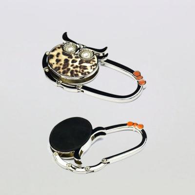 China Wholesale luxury custom logo bag/purse hanger hanger hook decoration/gift promotion in China for sale