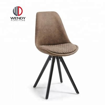 China Poland Modern Style PU Leather Dining Chair With Black Powder Coating Metal Legs for sale