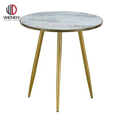 China Traditional Modern PVC Veneer Top And Legs Gold Chromed Dining Table for sale