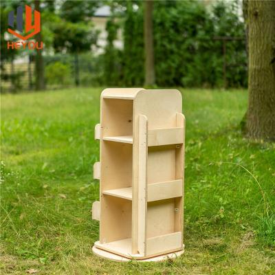 China Convertible Wooden Modern Rotating Tall Nursery Toy Storage Shelves and Bookcase Shelves for sale