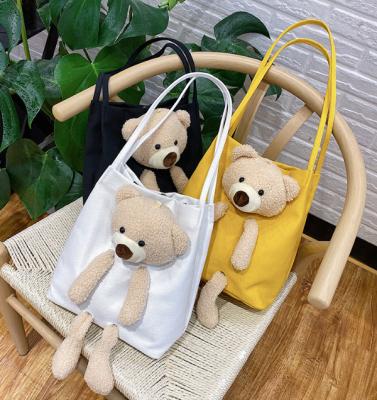 China Custom 2021 Summer Hot Selling Custom Creative Shoulder Bag With Plush Toy For Cute Teddy Bear Girl's Canvas Bag for sale