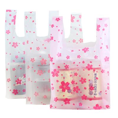 China 100pcs/lot Pink Cherry Blossoms Plastic Gift Bag Moisture Proof Packaging Bag with Handles Hot Pink Flower Gift Packaging Bag Party Supply for sale