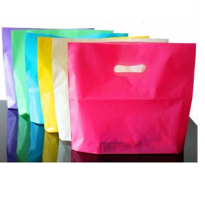 China 50pcs/lot Safety Colorful Plastic Shopping Bags With Handle Pink Boutique Clothes Gift Packaging Bag for sale