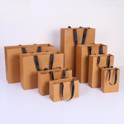 China Customized Recycled Materials Take Away Brown Reusable Paper Food Bag Fashion Shopping Bag Kraft Paper Bags for sale