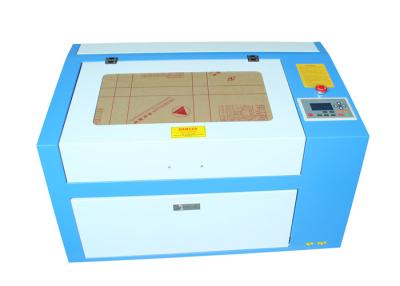 China Máquina de grabado industrial del cortador del laser de la mesa para los sellos/tarjetas de la imagen/de felicitación en venta