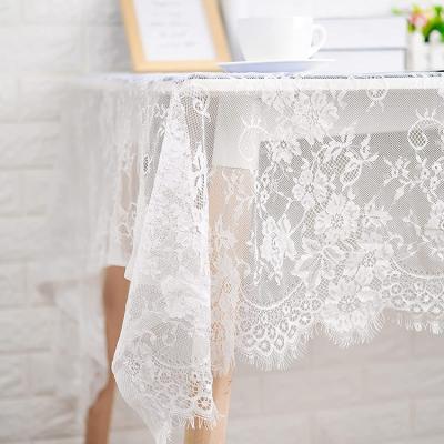 China Breathable Decorations White Floral Simple Jacquard Dinner Lace Polyester Wedding Table Cloths Fabric for sale