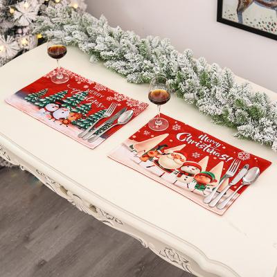 China Stored Creative New Christmas Decoration Atmosphere Table Printing Santa Place Mat Heat Insulation Pad for sale