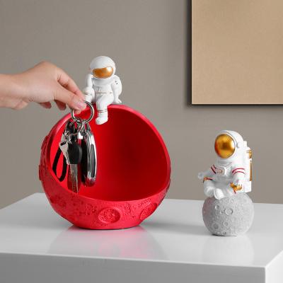 China Nordic Creative Novelty Decoration Storage Key Tray Home Decoration Astronaut Storage Box for sale