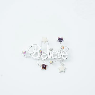 China ALLOY simple and fashionable design brooch word letter silver brooch embellished with small stars Christmas brooch for sale