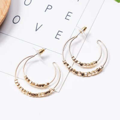 China 2021 TRENDY simple earrings new semi-arc Korean crescent beaded geometric metal personality earrings for sale