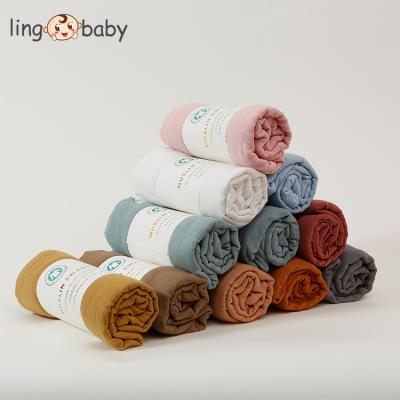 China Custom Printed Portable Baby Muslin Wraps Bamboo Plain Solid Muslin Wraps for sale