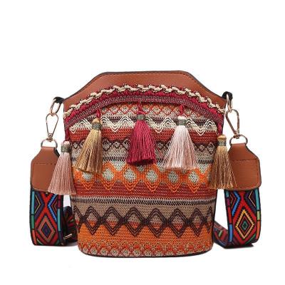 China SP564 2021 new fashion canvas style personality ethnic cross - body bag with tassel woven bucket bag for women for sale