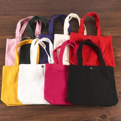 China Washable Factory SP1200 Stock Canvas Bag Custom Logo Handled Portable Clothing Tote Shopping Bag for sale