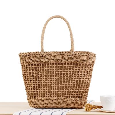 China Handmade Holiday Outing Bag Straw Woven Bag SP767 Durable Fashionable Personalized Rattle Basket Handwork Hollow Bag for sale