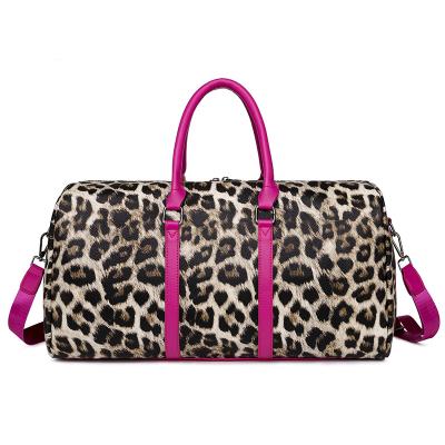 China SP463 Fashion Amazon Travel Handbag Leopard Print Leather Duffle Bag Large Size Luggage Bags For Ladies for sale